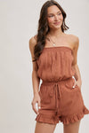 SMOCKED TUBE TOP RUFFLED HEM DRAWSTRING ROMPER