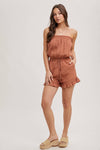 SMOCKED TUBE TOP RUFFLED HEM DRAWSTRING ROMPER