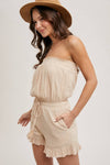 SMOCKED TUBE TOP RUFFLED HEM DRAWSTRING ROMPER