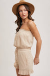 SMOCKED TUBE TOP RUFFLED HEM DRAWSTRING ROMPER
