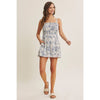 BREATHABLE FOR WARM DAYS PALM LEAF SMOCKED ROMPER