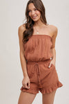 SMOCKED TUBE TOP RUFFLED HEM DRAWSTRING ROMPER