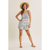 BREATHABLE FOR WARM DAYS PALM LEAF SMOCKED ROMPER