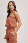 SMOCKED TUBE TOP RUFFLED HEM DRAWSTRING ROMPER