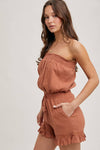 SMOCKED TUBE TOP RUFFLED HEM DRAWSTRING ROMPER