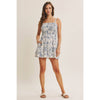 BREATHABLE FOR WARM DAYS PALM LEAF SMOCKED ROMPER