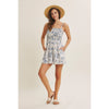 BREATHABLE FOR WARM DAYS PALM LEAF SMOCKED ROMPER